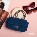 Bolso acolchado con cadena metálica y broche giratorio