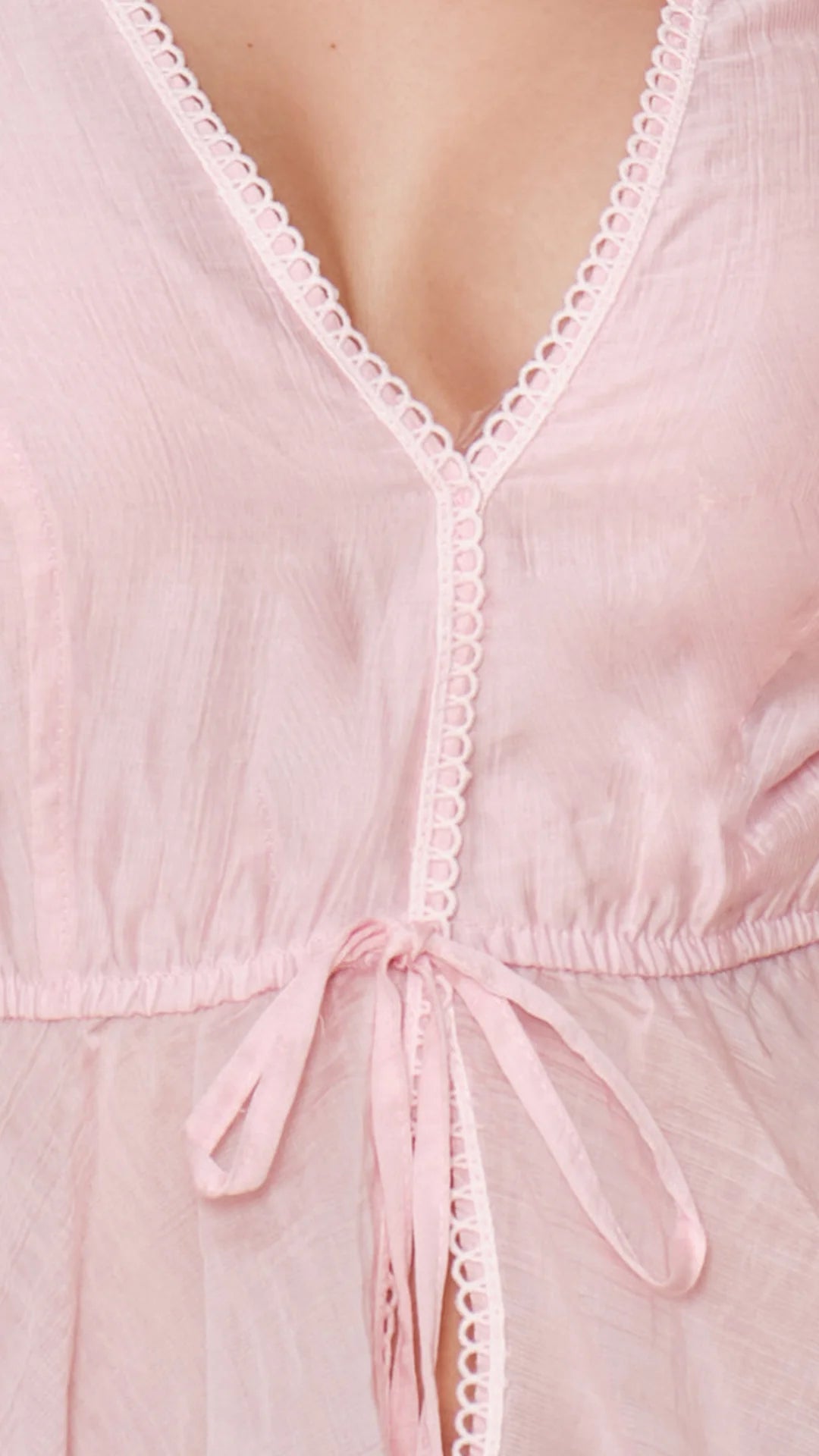 ROSADO - blusa-corta-con-escote-profundo-bolero-en-ruedo-rosado